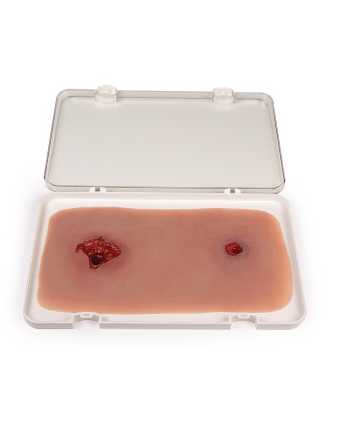 Moulage e simulazione di ferita da arma da fuoco alla gamba con funzione di