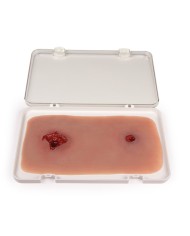 Moulage e simulazione di ferita da arma da fuoco alla gamba con funzione di